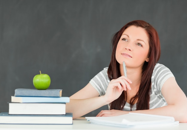 Young student writting an essay