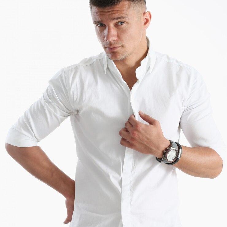 Photo young successful businessman on a white background in a shirt