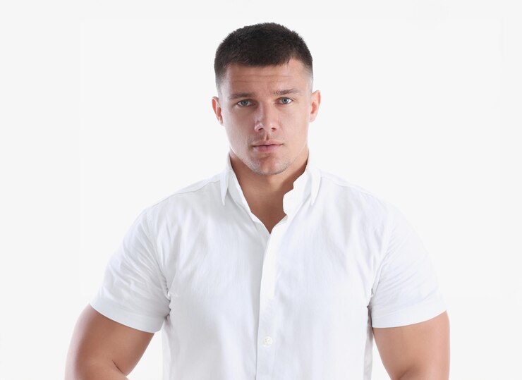 Young successful businessman on a white