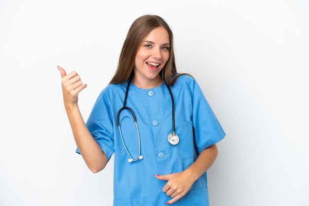 Young surgeon doctor Lithuanian woman isolated on white background making guitar gesture