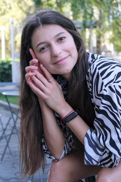 Young tall girl with long straight hair