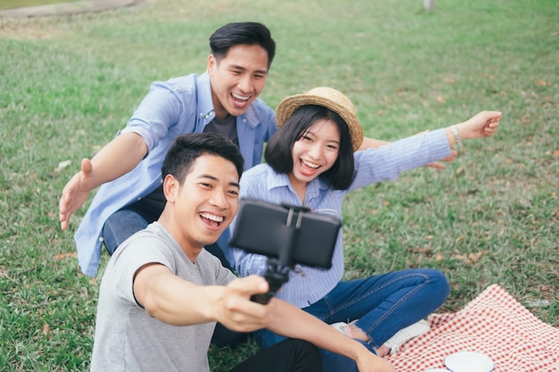 Young teen groups selfie by mobile phone