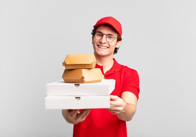 Young teenager man young pizza deliver man happy expression