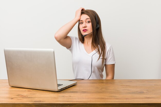 Young telemarketer woman being shocked, she has remembered important meeting.