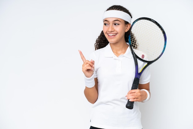 Young tennis player woman isolated on white background intending to realizes the solution while lifting a finger up