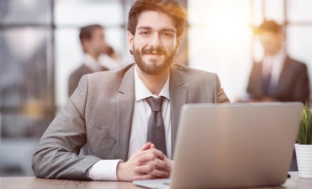 Young thoughtful business man executive manager wearing suit working in modern office