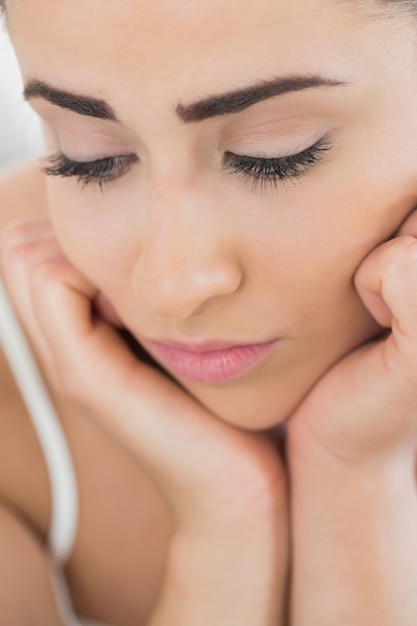 Young thoughtful woman posing for the camera