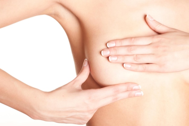 young topless woman doing breast selfexam breast cancer awareness