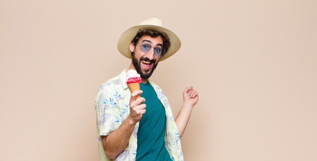 Young tourist man having an ice cream