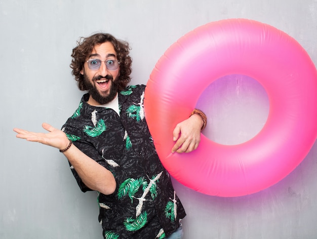 Young tourist man with a float