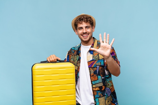 young tourist man with a suitcase