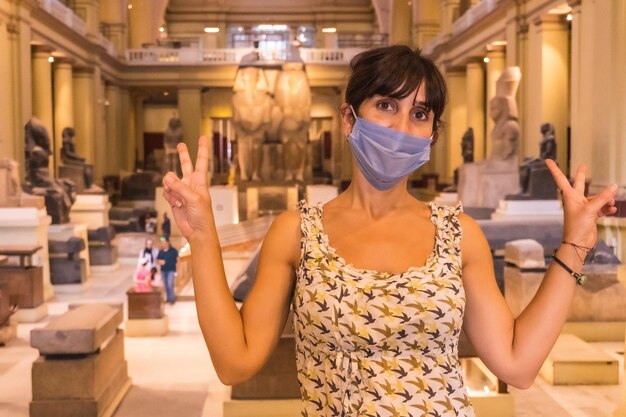 A young tourist visiting the Egyptian Museum in Cairo