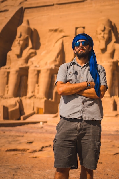 A young tourist with a blue turban visiting the Abu Simbel