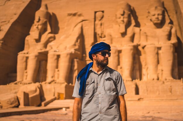 A young tourist with a blue turban visiting the Abu Simbel