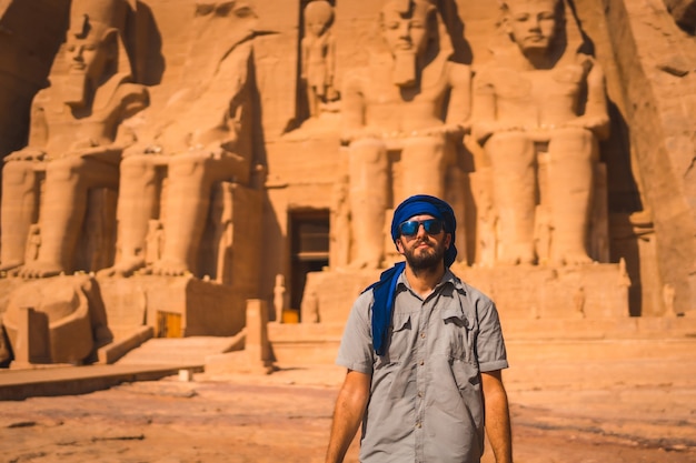 A young tourist with a blue turban visiting the Abu Simbel