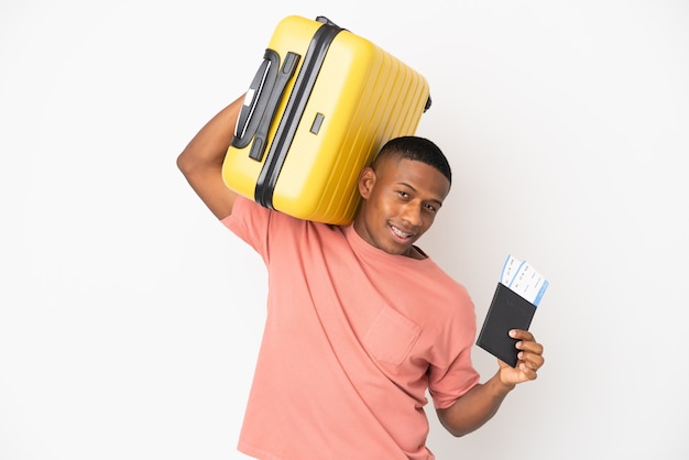 Young traveler holding a suitcase