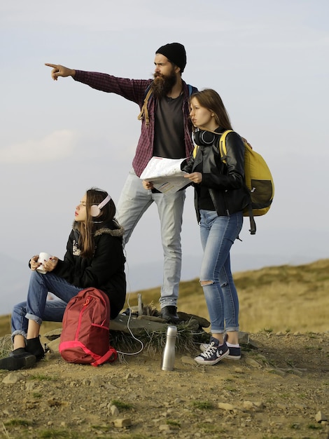 Young travelers with map