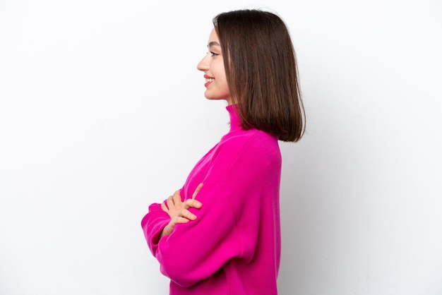 Young Ukrainian woman isolated on white background in lateral position