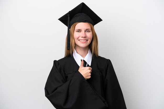 Young university graduate english woman isolated on white\
background giving a thumbs up gesture