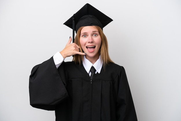 Young university graduate english woman isolated on white\
background making phone gesture call me back sign