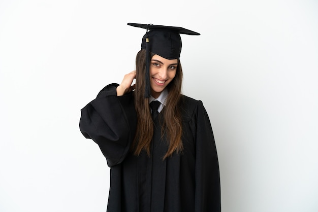 Young university graduate isolated on white background laughing