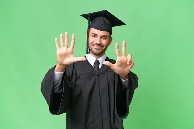 Young university graduate man over isolated background counting eight with fingers