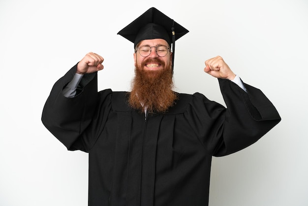 Young university graduate reddish man isolated on white background doing strong gesture