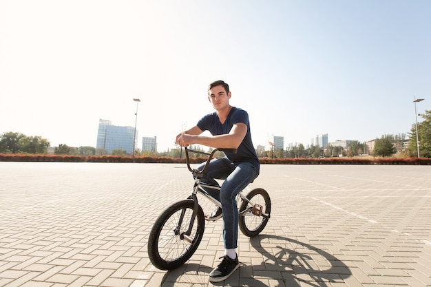 Young urban bmx racer in the city