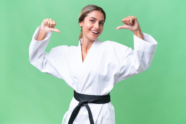 Young Uruguayan woman over isolated background proud and selfsatisfied