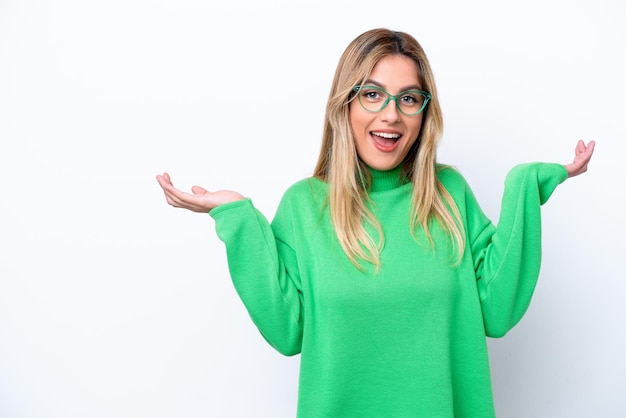 Young Uruguayan woman isolated on white background with shocked facial expression