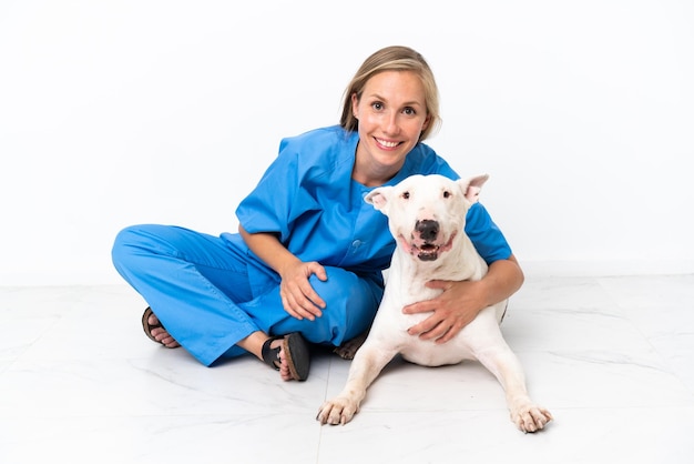 Young veterinarian English woman with dog