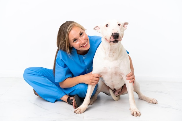 Young veterinarian English woman with dog