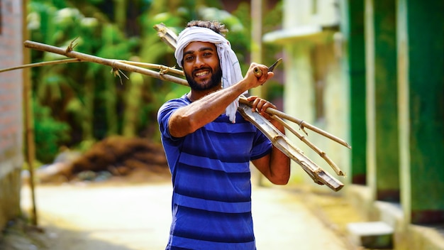 Young villager man farmer happy indian farmer labor boy image