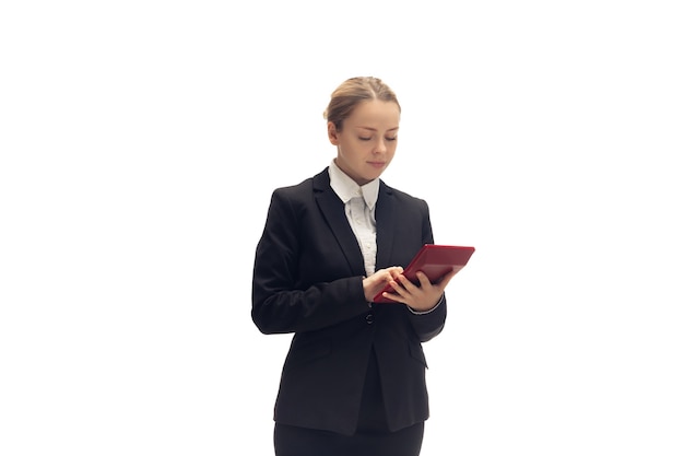 Young woman accountant booker in office suit isolated on white studio background