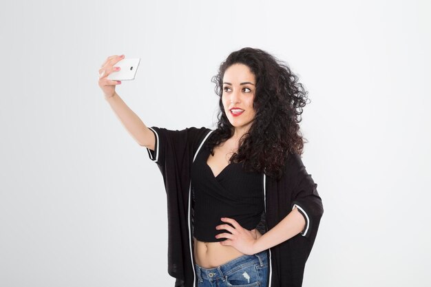 Photo young woman against white background