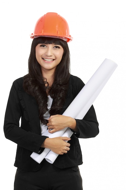 Young woman architect with orange helmet