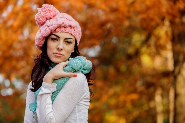 Young woman at autumn forest