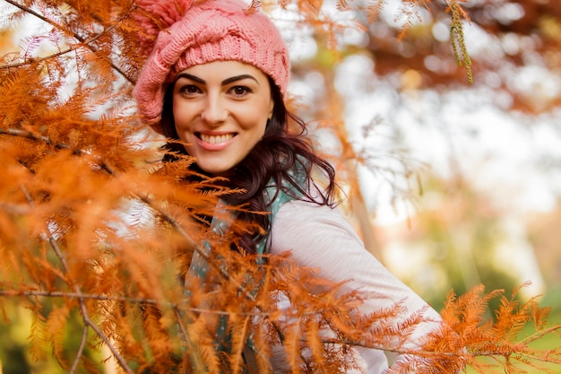 Young woman at autumn forest