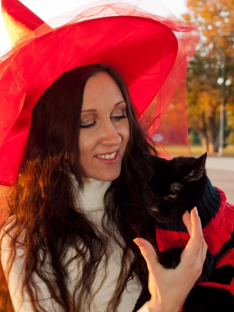 Young woman in autumn park.