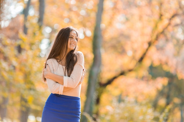 Young woman at autumn park