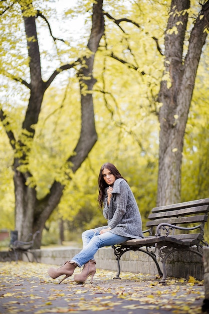 Young woman at autumn park