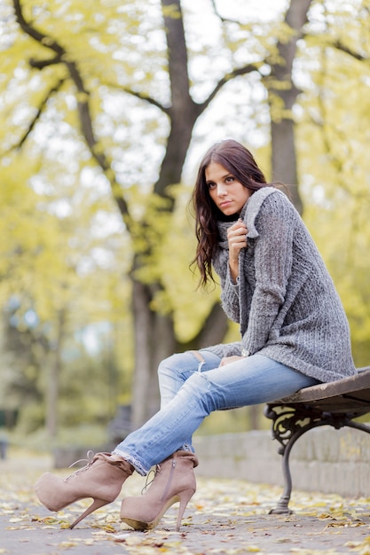 Young woman at autumn park