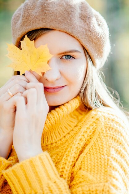 Young woman in beautiful autumn park