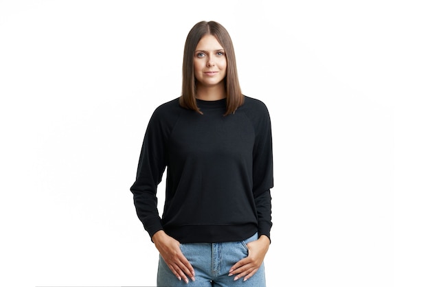 Young woman in black blouse isolated. High quality photo