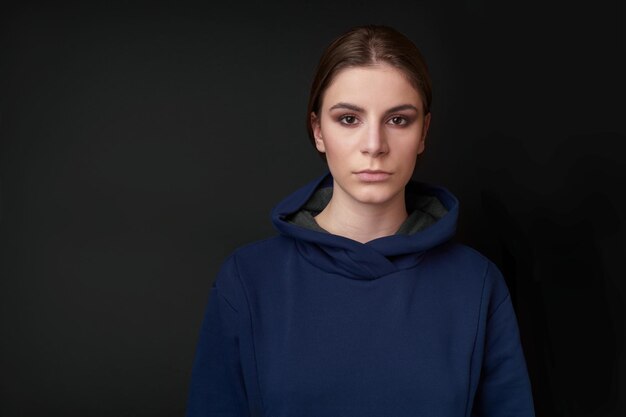 Photo young woman in blue hoody