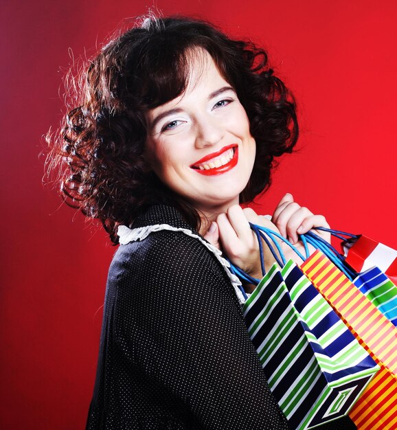 Young woman carrying shopping bags