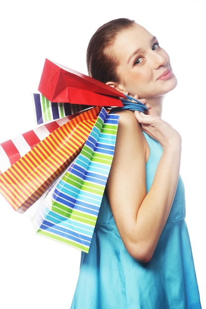 Young woman carrying shopping bags