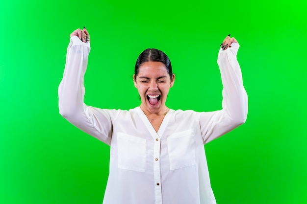 Young woman celebrating with chroma background