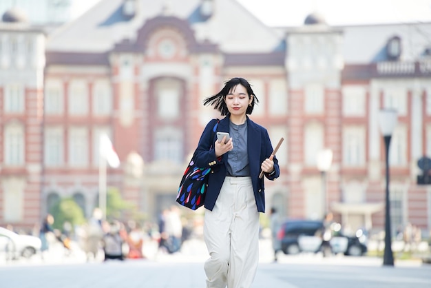 A young woman commuting and going out