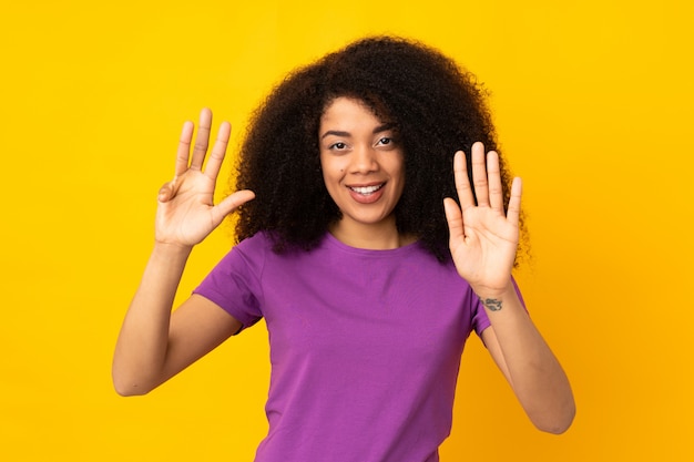 Young woman over counting nine with fingers